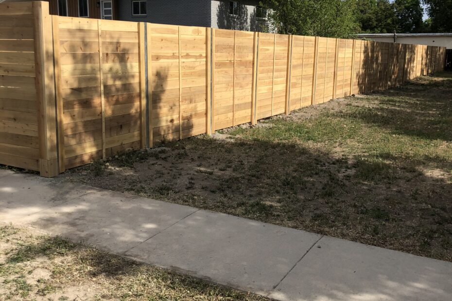 Cedar fence with Postmaster Steel Posts